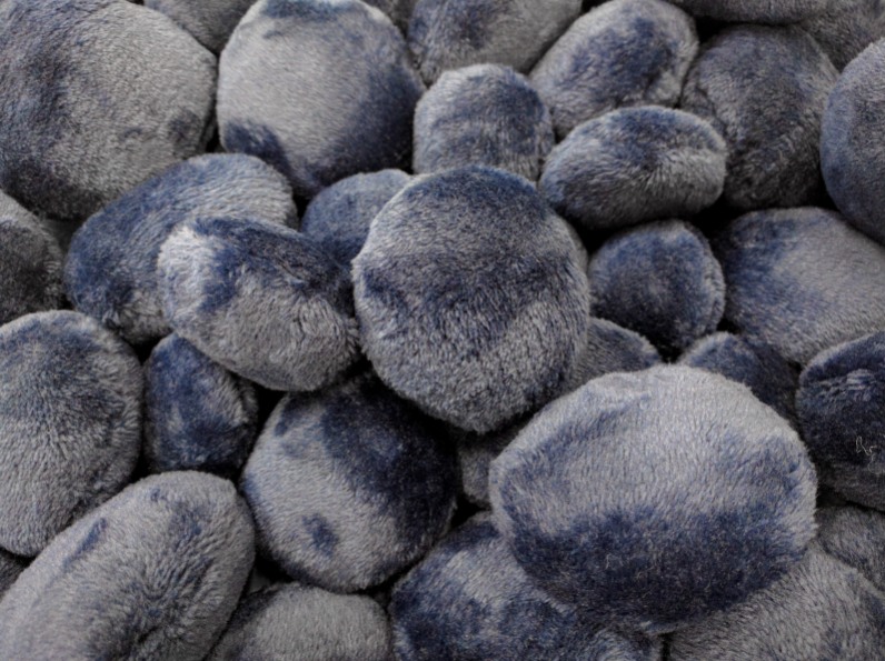 Artist Yuen-Ying Lam invites you to touch these soft pebbles in To Hold and Be Held at artsdepot